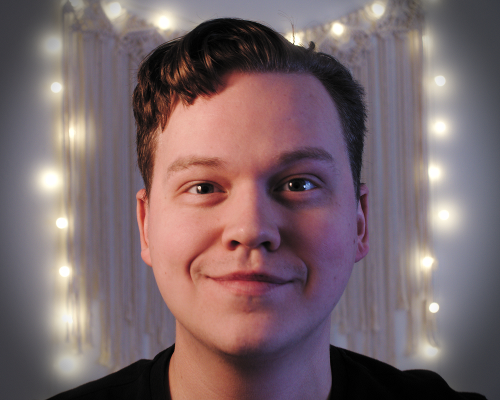 A picture of my face. I’m a white guy in my 30s, clean shaven with a fade haircut.